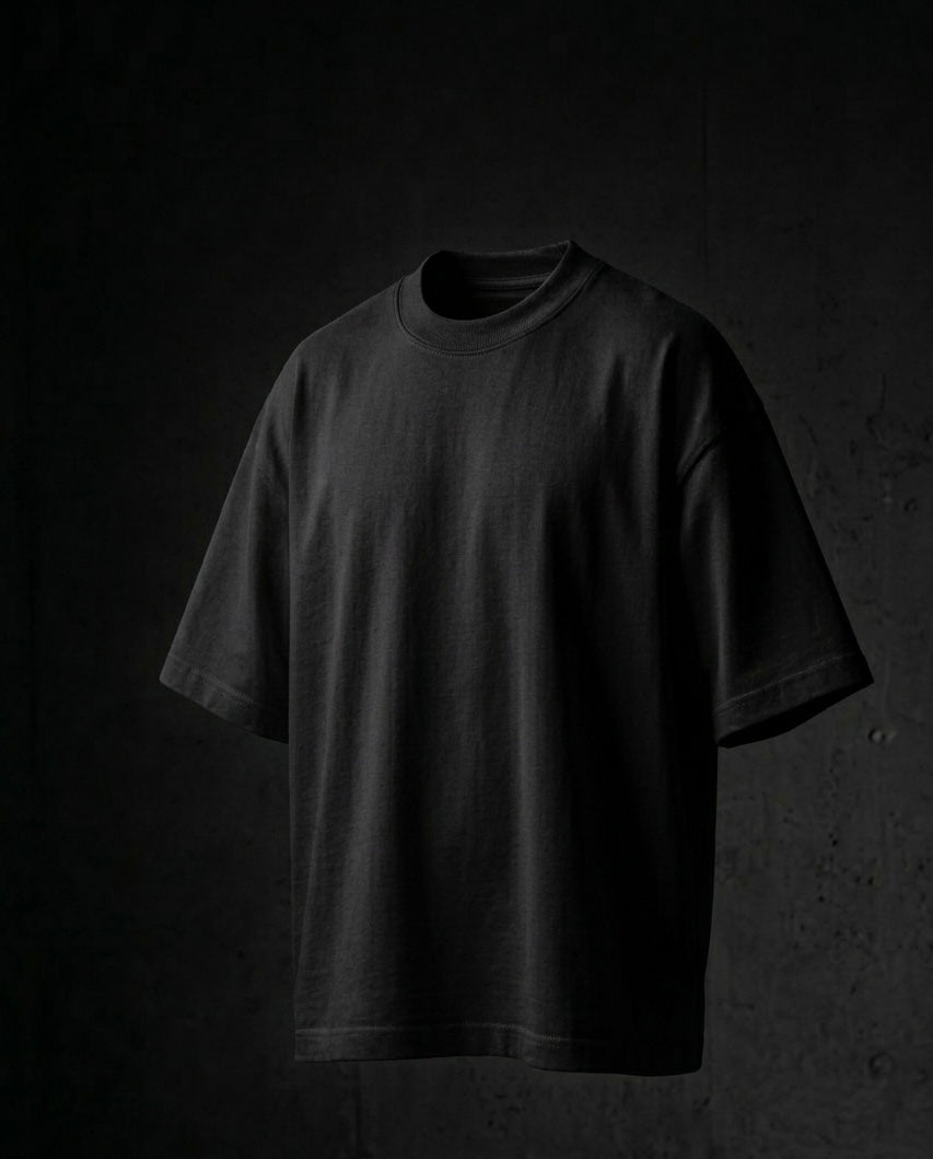 Image 1: 220 GSM matte black oversized drop-shoulder unisex t-shirt, bio-washed — THE OUR STORE