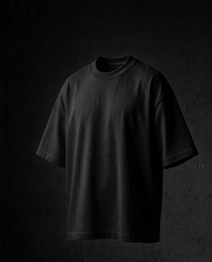 Image 1: 220 GSM matte black oversized drop-shoulder unisex t-shirt, bio-washed — THE OUR STORE