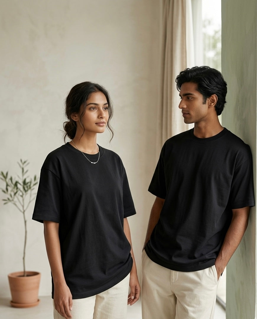 Image 3: 220 GSM matte black oversized t-shirt on model — THE OUR STORE Vol. 01